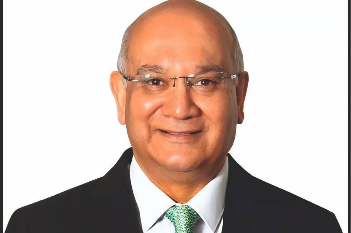 Photograph of Keith Vaz, smiling towards the camerar. He is wearing a suit and tie. The background is plain white.